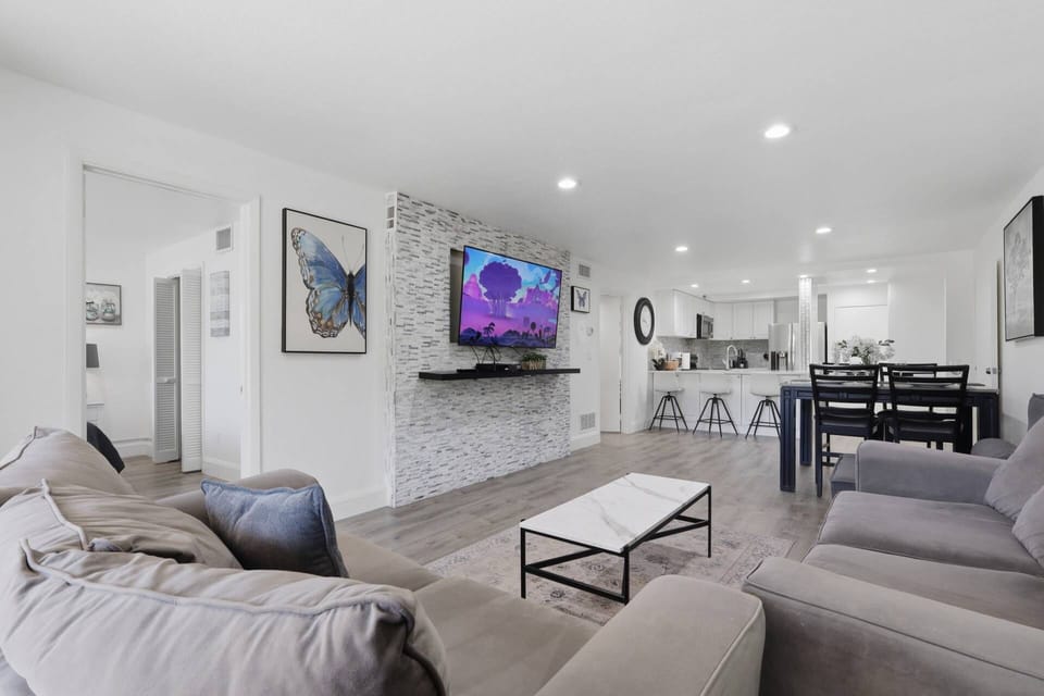 Bright, airy, and beautifully updated — this inviting living area blends comfort and style with seamless flow into the kitchen and dining spaces.