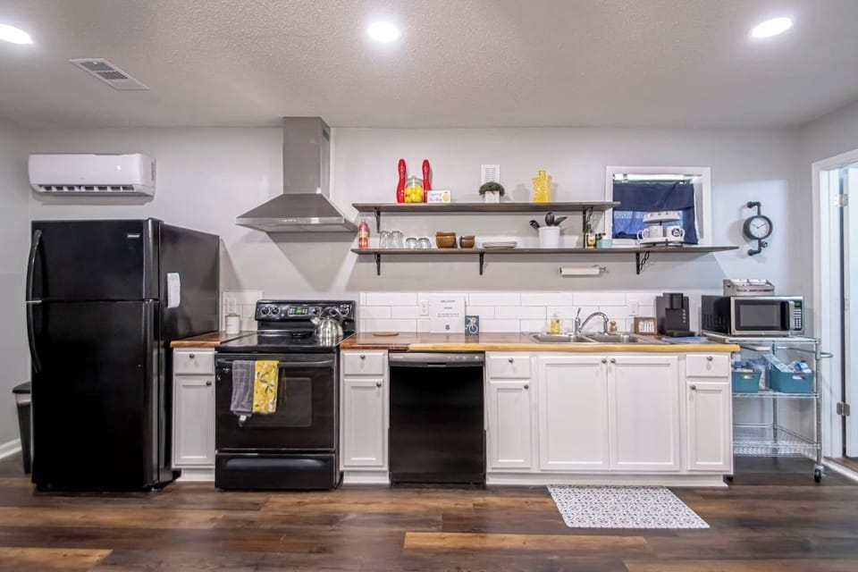 Full size kitchen appliances, including dishwasher.