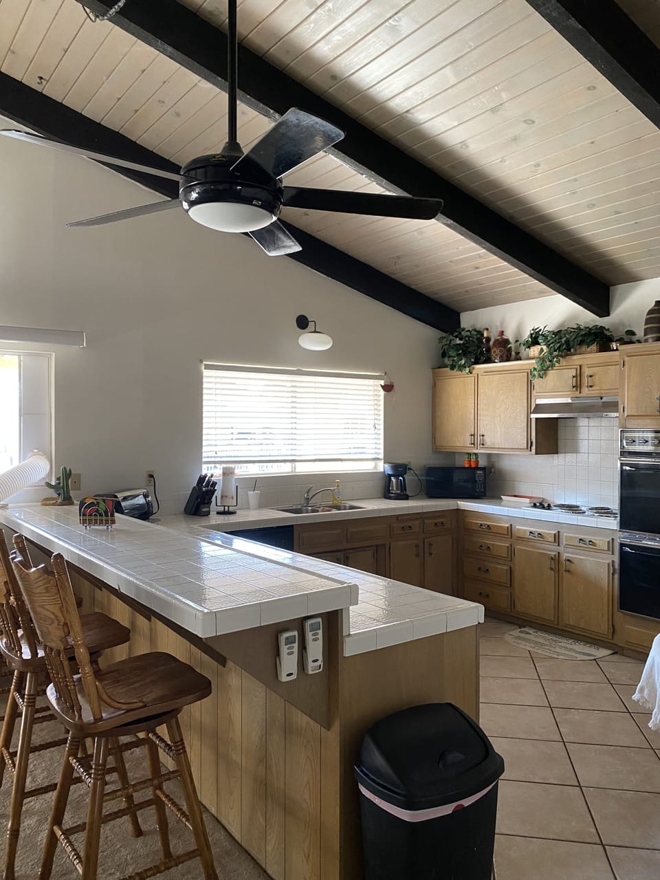 Large Kitchen & bar w/ 4 tall chairs. Dishwasher w/ all kitchen appliances. 