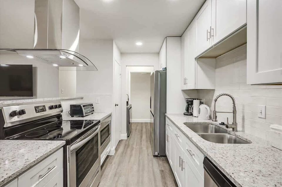 Brand new kitchen with stainless steel appliances 