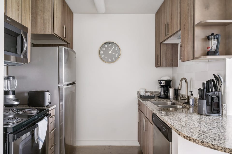 Whip up tasty treats in this modern kitchen with all the essentials.