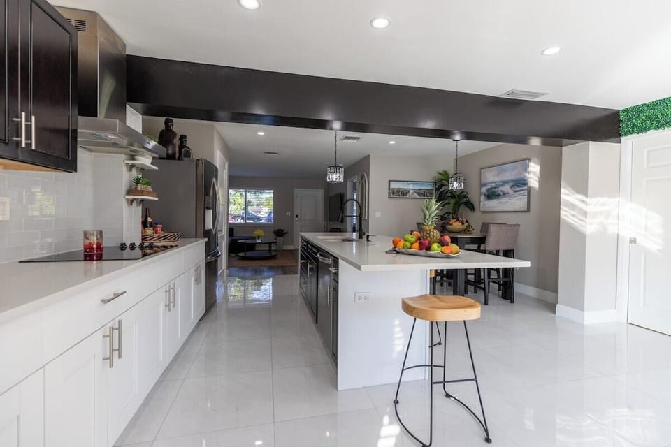 Bright, fully-stocked kitchen awaits your culinary skills. Perfect for foodies. Book now for a delicious getaway!