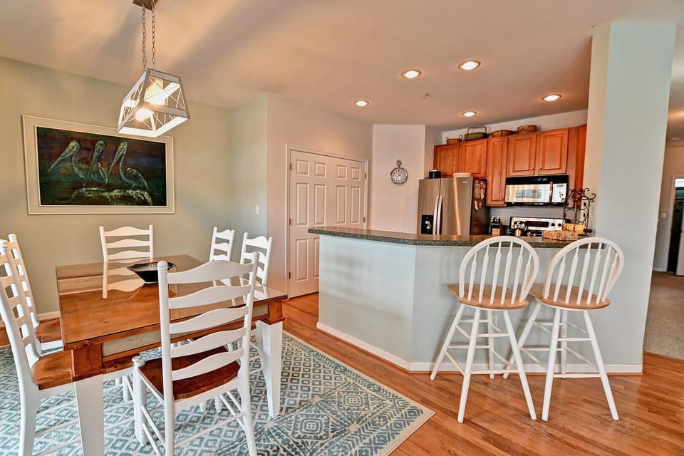 Living Room view into Kitchen and Dinning Room