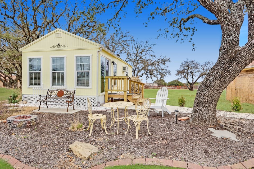 Close up of seating area in front of the cottage.