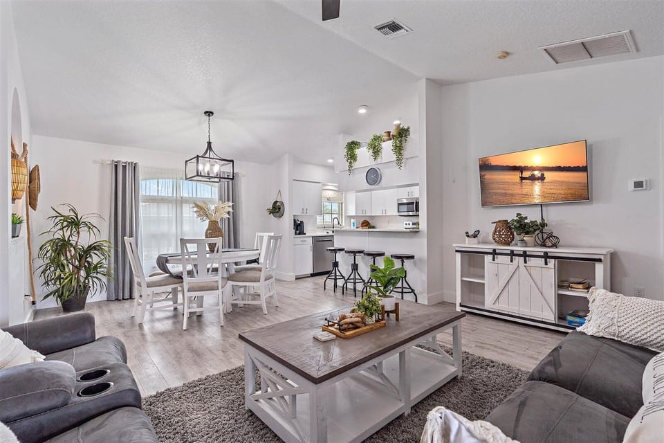 Living room and dining room are all in one open space for convenience.