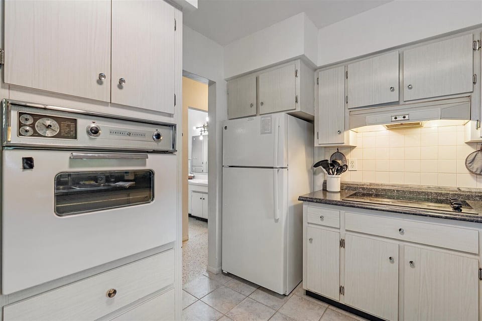 Note, the countertops have been replaced.