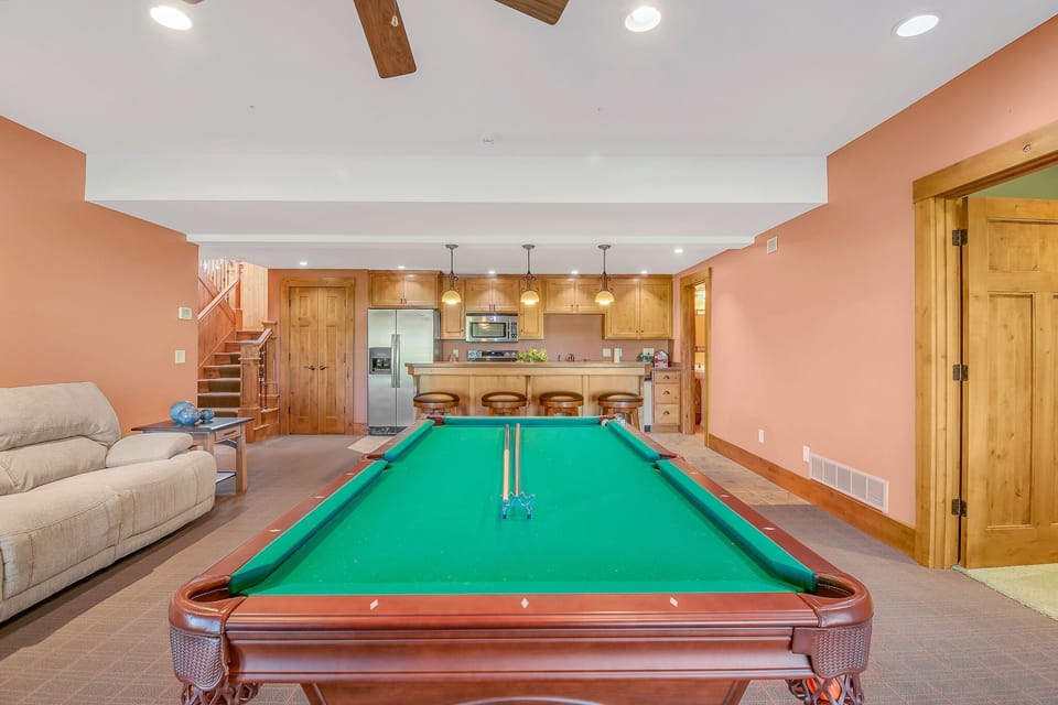 Enjoy a game of pool in the downstairs game room!