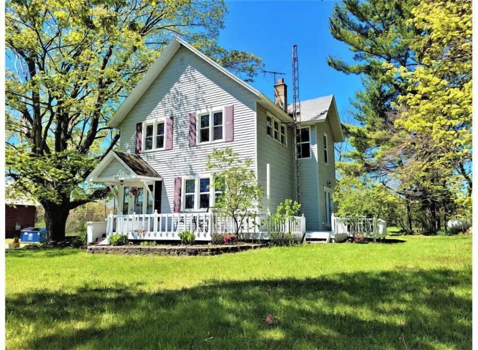 1930 Farmhouse on 4 acres surrounded by beautiful apple and cherry orchards. 