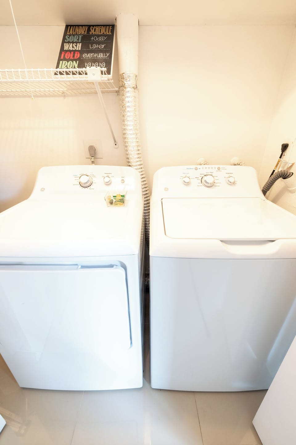 Washer and drier are inside the house +complimentary detergent