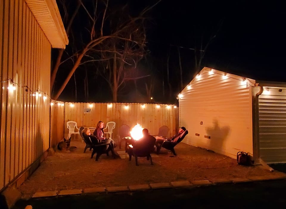 private fenced in yard is perfect for  toasting, roasting and relaxing 