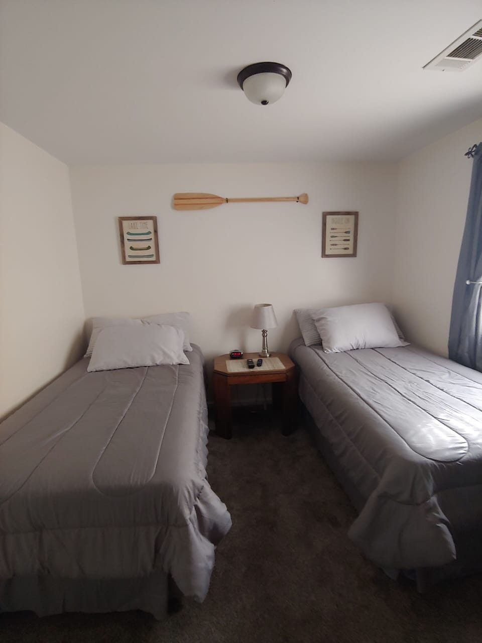 Bedroom #2--2 twin beds and 1 ottoman/ twin bed  and closet also  Roku tv