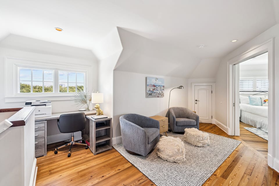 3rd floor retreat with two bedrooms, a workspace, TV lounge, and