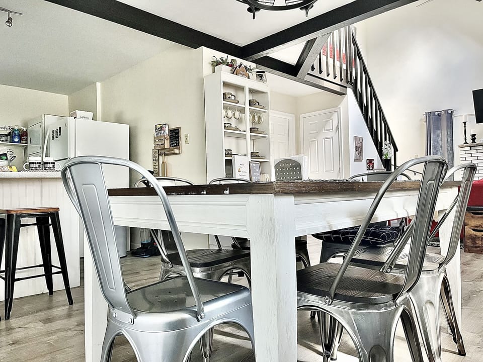 New farmhouse metal dining chairs. Views of the ski lift, slope wooded mountains