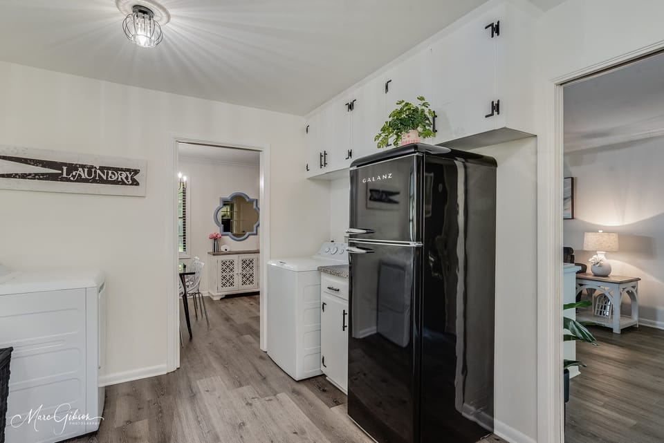 Full size washer and dryer located in the home.  
