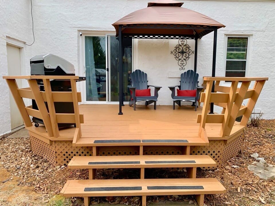 Relax on the back deck with an amazing view.  New stainless gas grill available for use.