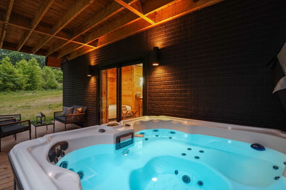 Just outside the basement sliding patio door, the hot tub and conversation area are waiting for you!