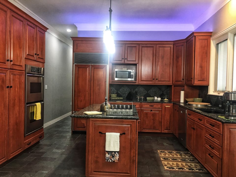 Large kitchen with double oven , all small appliances and space for prep.