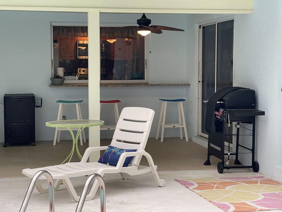 Pass thru window from the kitchen for all your BBQ'ing and party favors 