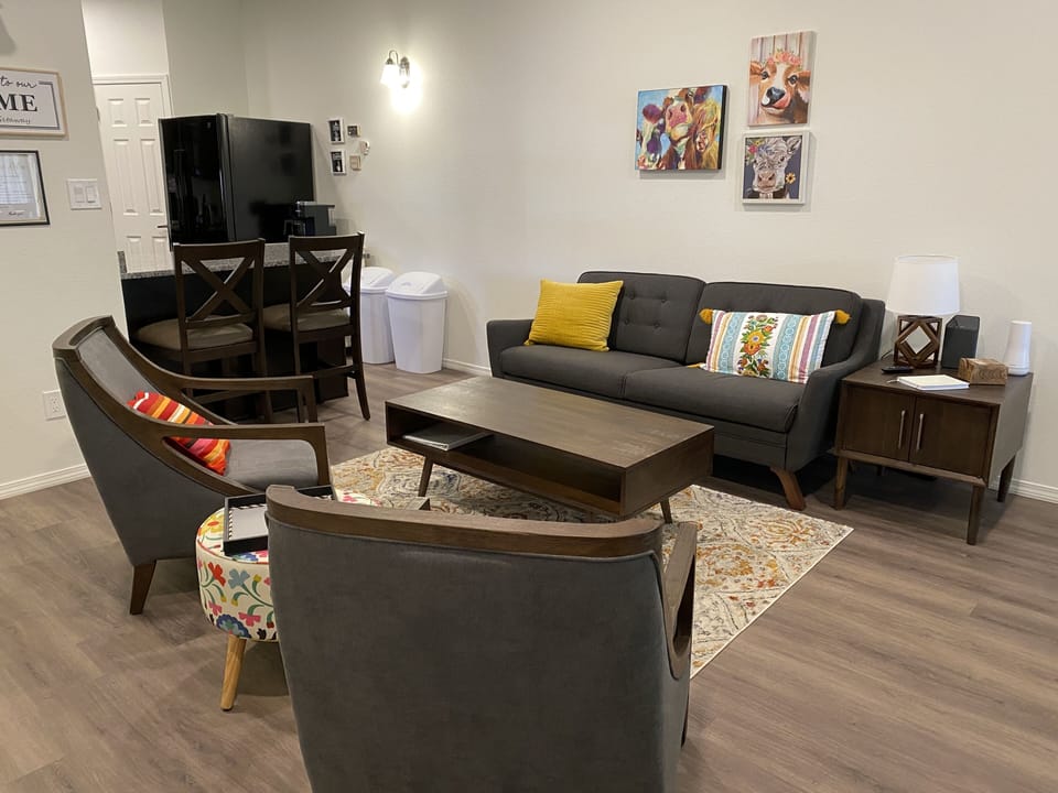 Main floor sitting area with a 50 inch smart TV.