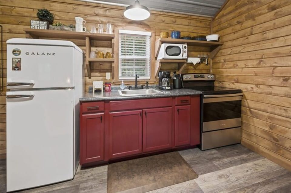 Full kitchen, retro fridge, electric range, microwave, coffee pot