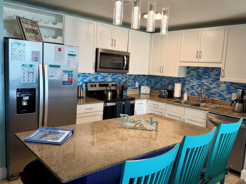 Experience a luxury kitchen with updated stainless steel appliances