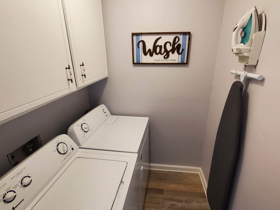 Full-size washer and dryer available for use.