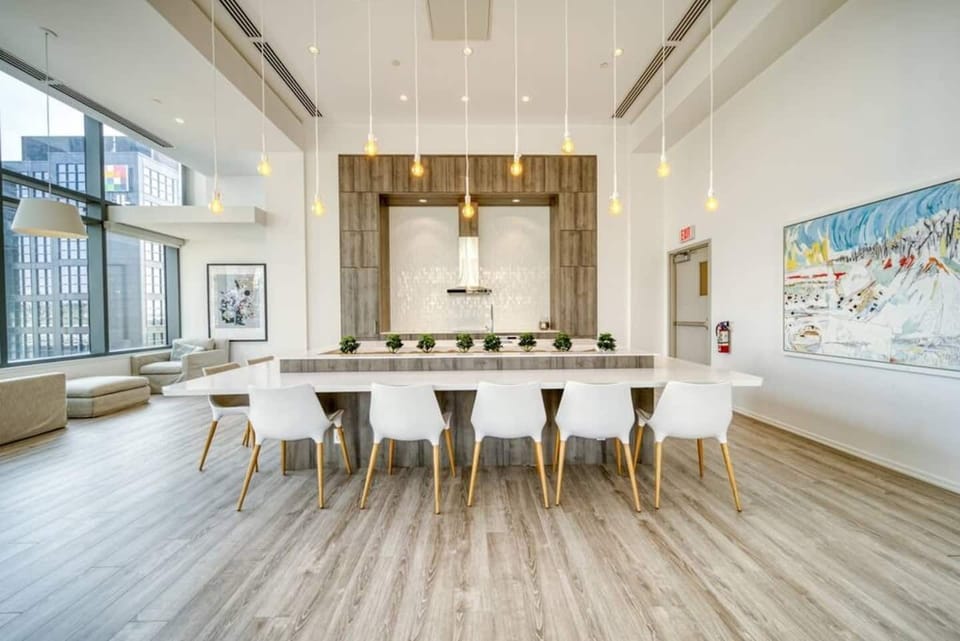 Shared building amenities, including a hangout space, rooftop patio, gym and more. 