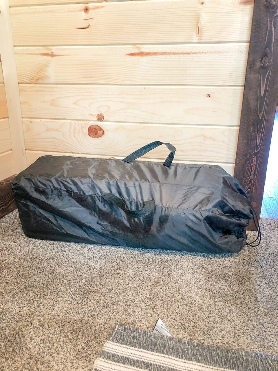 Children's pac-n-play located under the bed on the main level. 