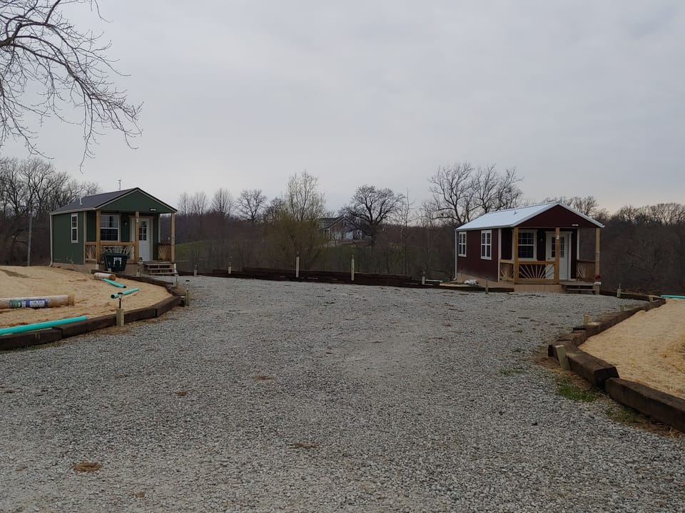 Lit gravel parking area