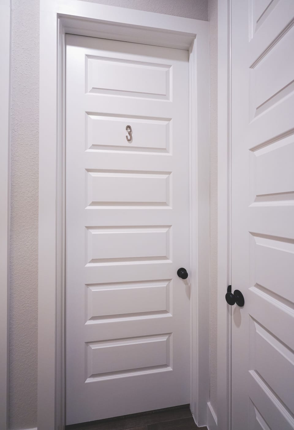 Room #3 is the second bedroom on the left when you walk in.