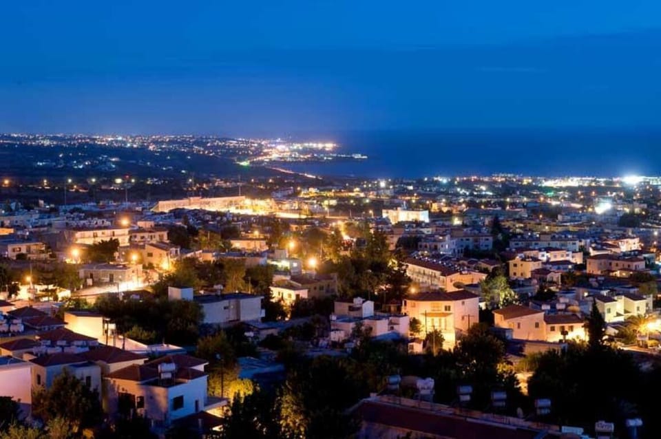 The view from the balcony of the twinkling lights of the village