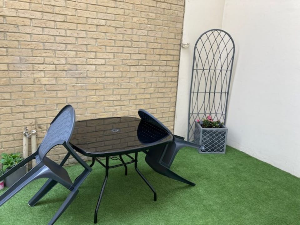 Outside patio with patio table and chairs furniture