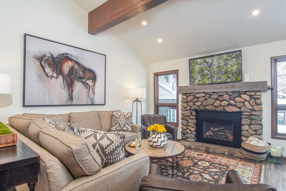 Large TV in Living Area above Gas Fireplace