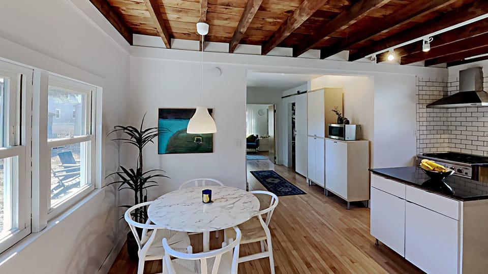 The main bedroom is on the first floor down the back hallway.  No stairs to negotiate!