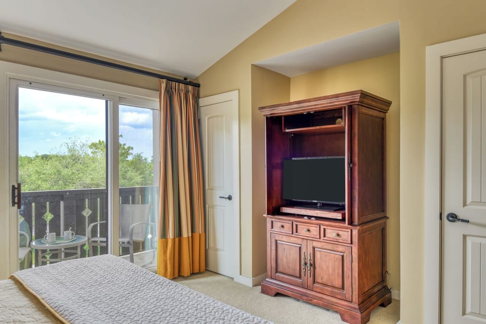 Bed to TV and Private Balcony