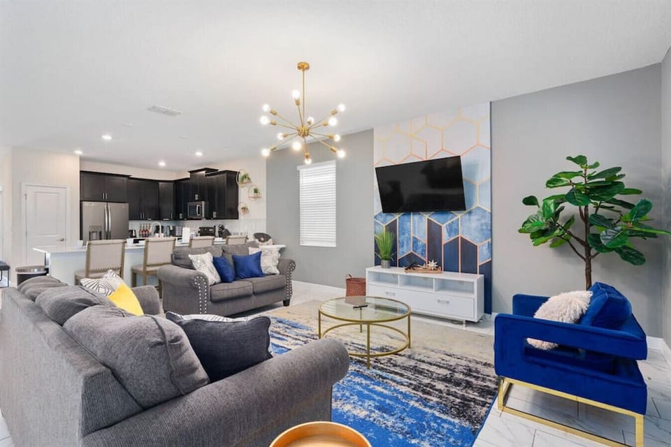 Miraculous spaces come to life in this living room and kitchen! Come together with your family and friends, making special memories that will last a lifetime. Be prepared for complete comfort as the tasteful decor provides an atmosphere of indulgence.