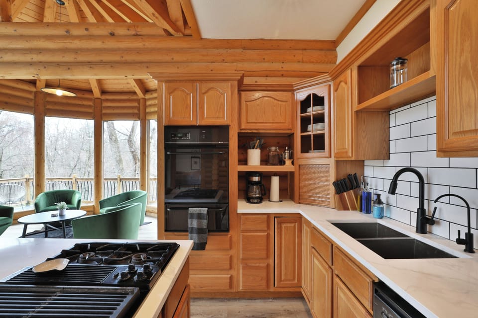 First floor full kitchen. Gas stovetop, sink, coffee maker, oven and dishwasher