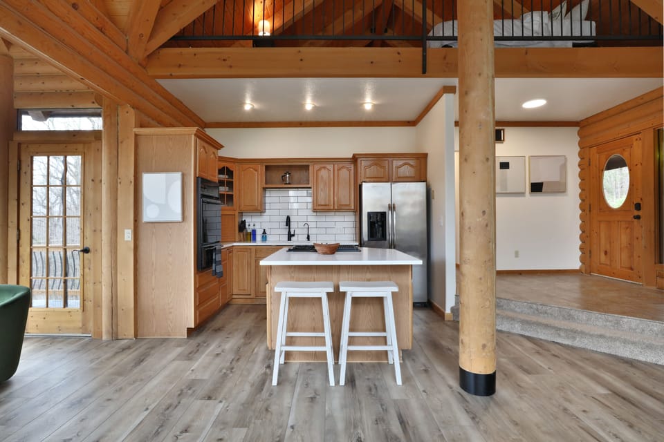 First floor full kitchen. Gas stovetop, sink, coffee maker, oven and dishwasher