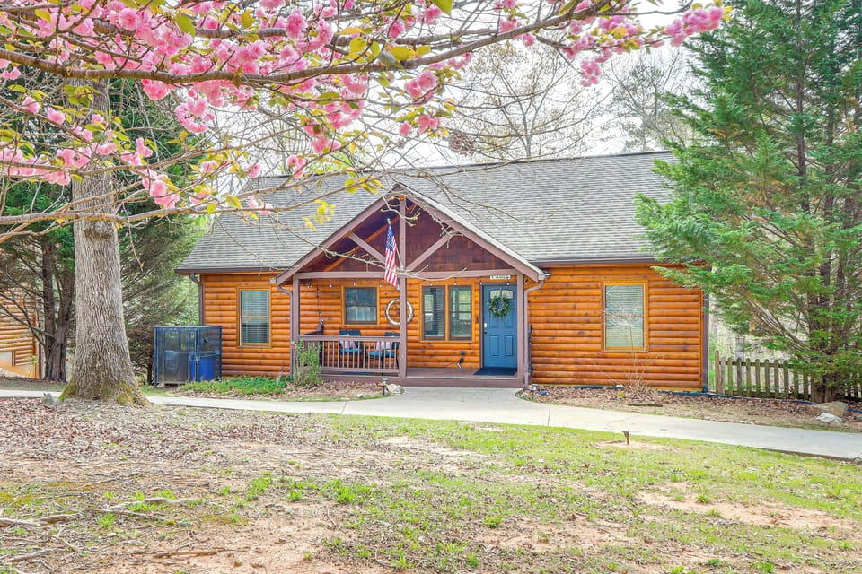 Property Exterior | 2-Story Cabin | Front Porch w/ Seating