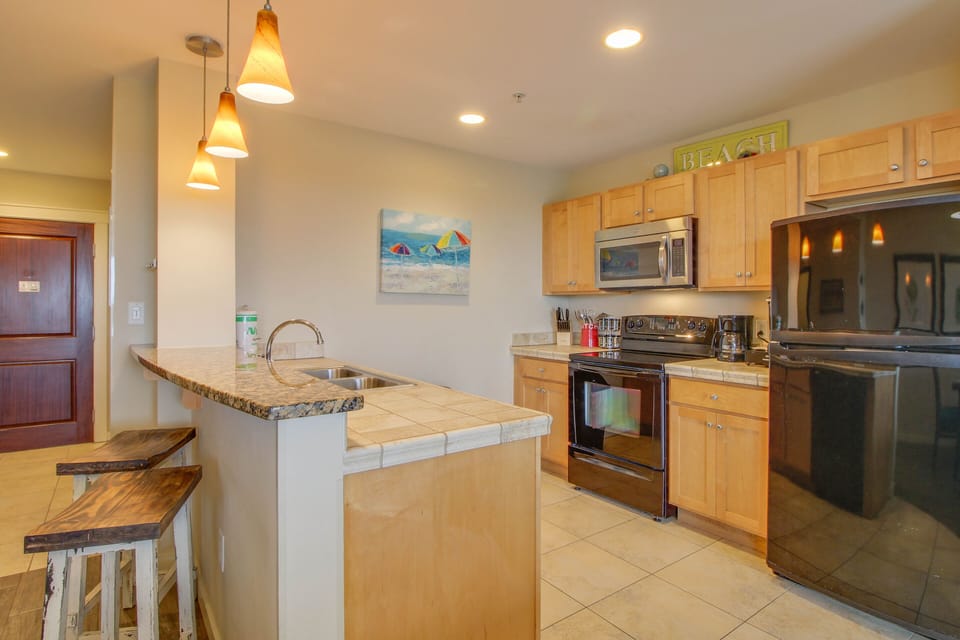 Large kitchen! We have everything you'll need to make some quick meals including a stove, microwave, toaster, single serve coffee machine, blender, and cooking utensils.