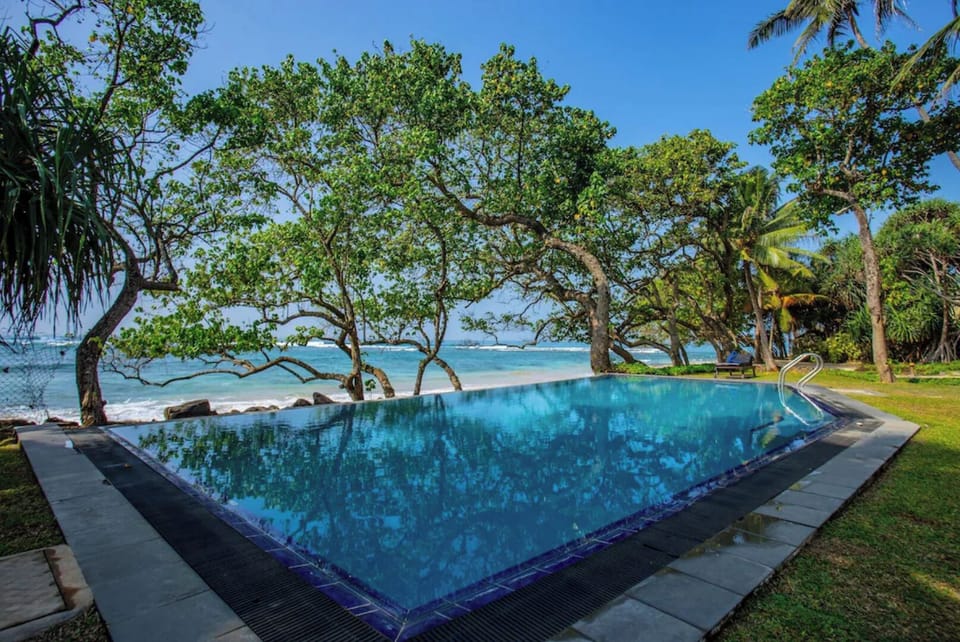 Private outdoor infinity pool.  For resident guests only.  Pool is cleaned daily