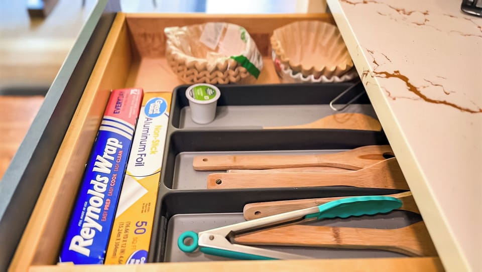 Newly renovated kitchen complete with appliances, cookware, and utensils