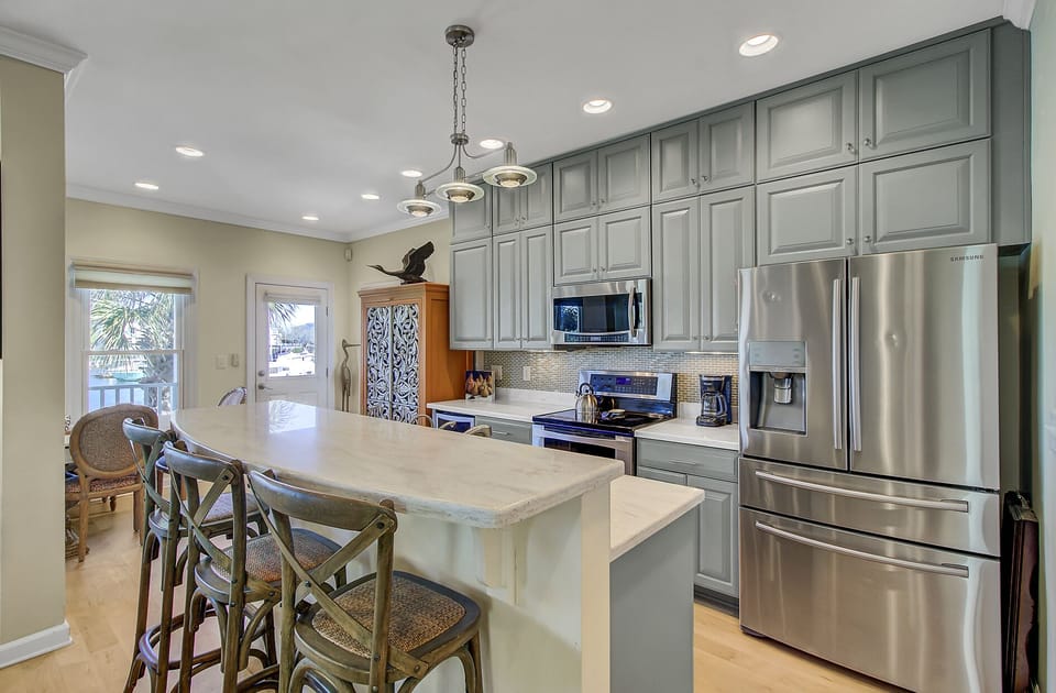 Fully stocked and modern kitchen.