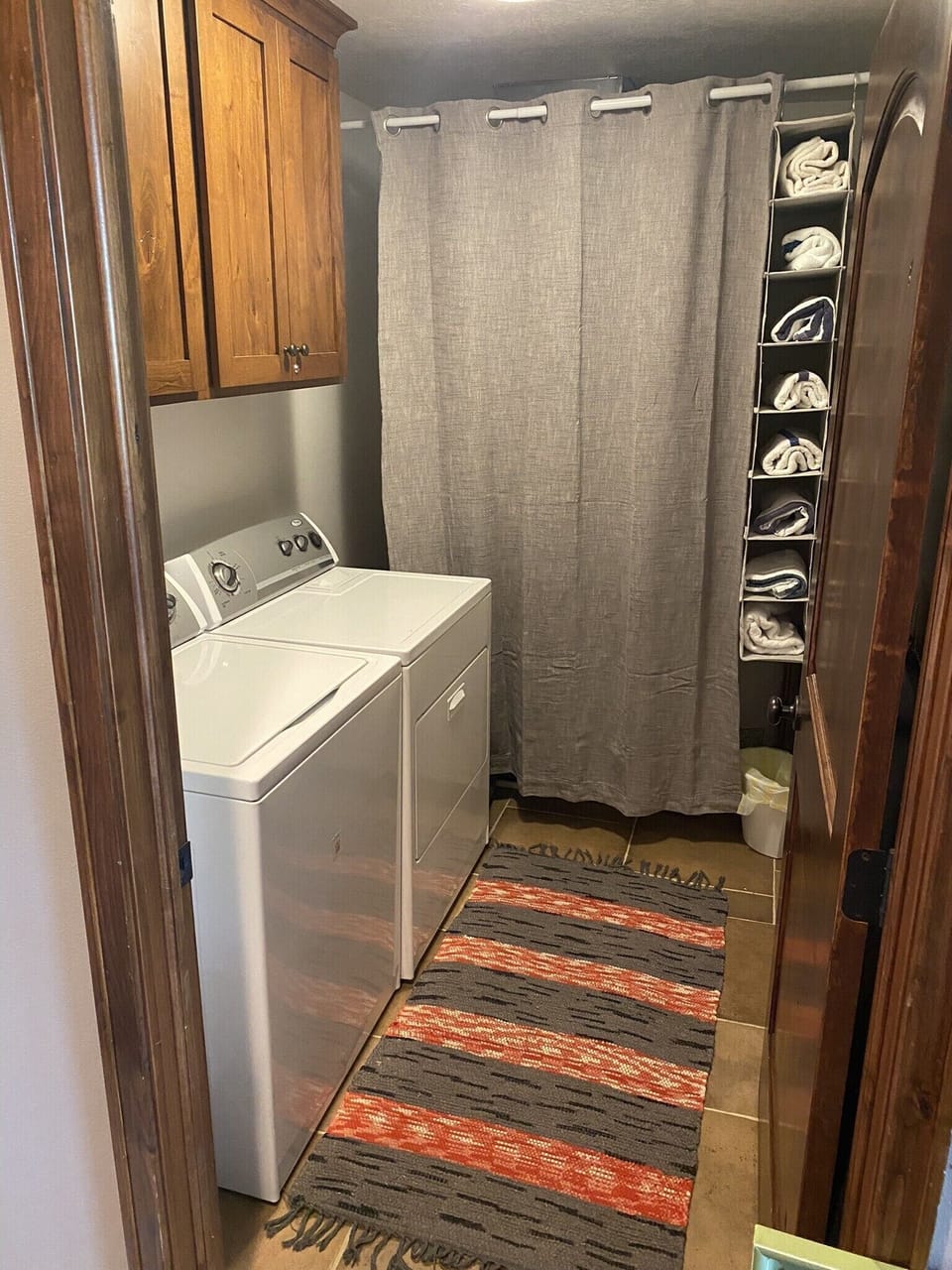 Full size laundry room with detergent / fabric softener, iron (if you do that!) 