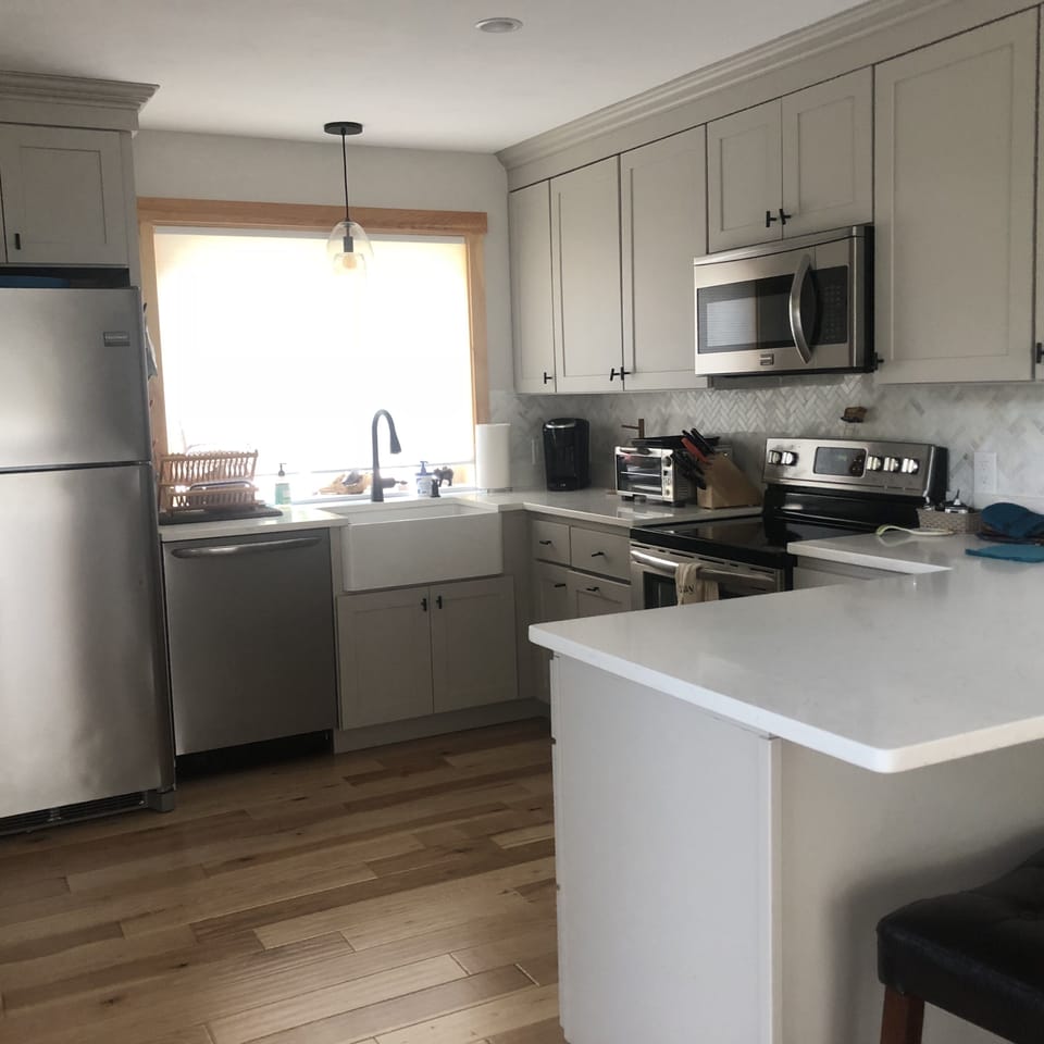 Open concept kitchen & breakfast bar. Open to dining & family room (2nd floor)