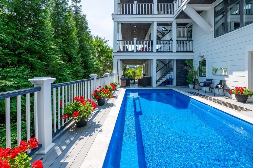 Enjoy the gorgeous outdoor pool and spacious, multi-level outdoor entertaining areas, this property offers the ultimate seaside retreat.