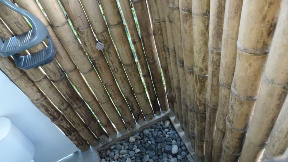 Outdoor bamboo shower with hot water