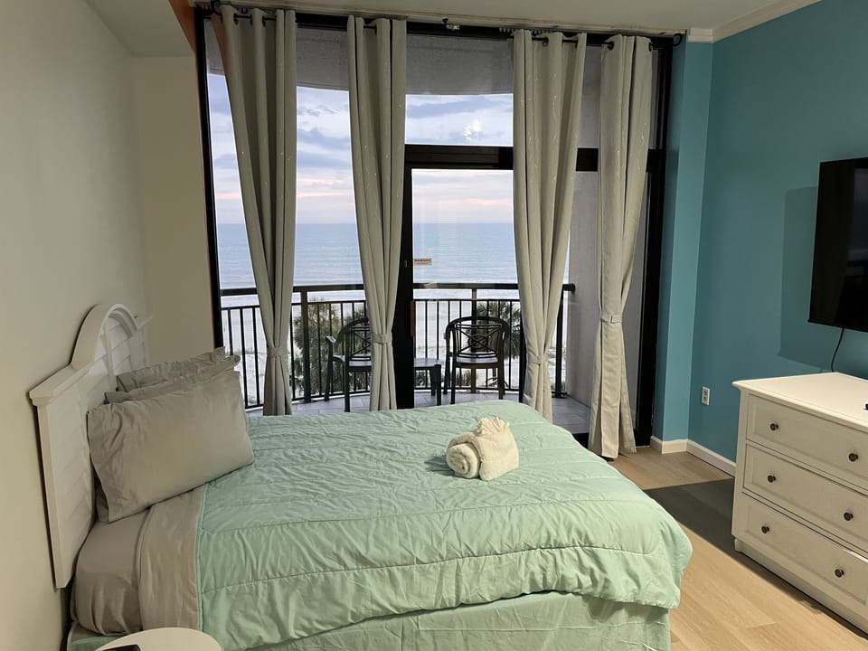 Bedroom2- Oceanfront, Tall ceilings with exquisite curtains