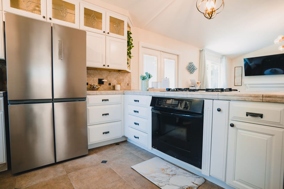 Stove with downdraft vent; new fridge. 