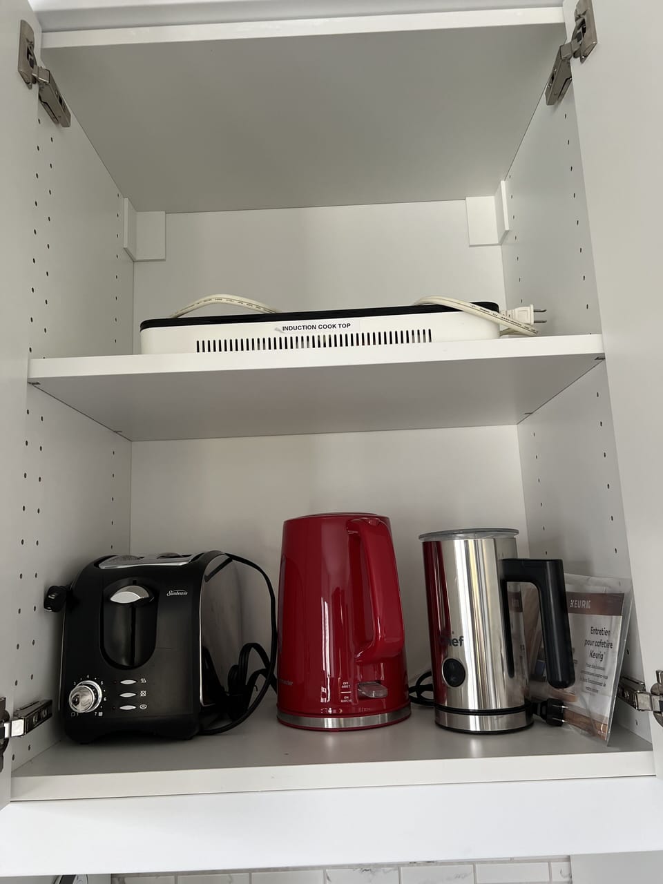 Induction stove top, toaster, milk frother and kettle.